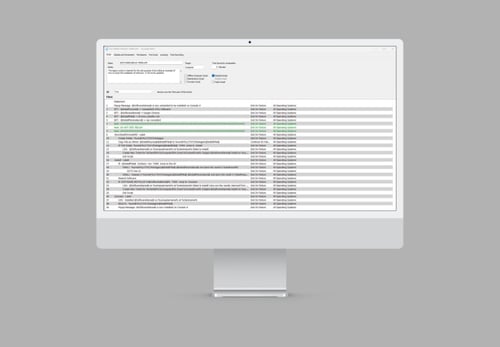 Computer monitor displaying a dense list of logs or records, each with details such as timestamps, event descriptions, and status indicators, suggesting an event log or audit trail interface in a system monitoring application